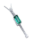Right side view of a women's natural Colombian emerald necklace, accented by straight line of natural diamonds white background