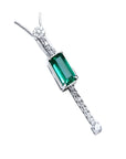A women's natural Colombian emerald necklace, accented by straight line of natural diamonds crafted in 14k white gold.