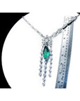 Marquise necklace 2.12 carats Colombian emerald and diamonds 14K white gold next to a ruler for measuring size