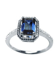 Women's sapphire solitaire ring medium light blue accent diamonds 14K white gold, front position top full view