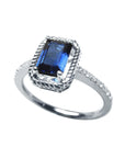 Women's sapphire solitaire ring medium light blue accent diamonds 14K white gold, lateral position half profile view