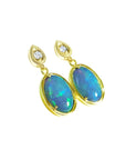 Bluish-green solid Australian opal dangle earrings with diamond studs set in 14K yellow gold.