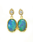 Australian opal earrings with gold setting on a topside view position.