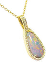 4.30 ct. solid Australian opal teardrop pendant with fiery red-orange flashes, halo diamonds, 18K yellow gold chain.