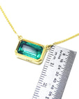 Ladies Genuine Emerald necklace for sale east-west orientation handcrafted in 18k yellow gold