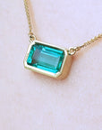 Real Colombian Emerald solitaire necklace for sale east-west orientation handcrafted in 18k yellow gold