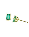 Emerald cut emerald stud earrings, 0.78 ct, in 14K yellow gold basket setting with push backs.