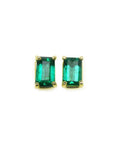 Pair of natural colombian emerald solitaire stud earrings made of 14kyellow gold.