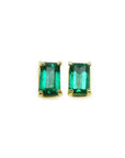 Pair of natural colombian emerald solitaire stud earrings made of 14kyellow gold.