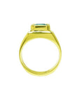 1.53 ct. square emerald bezel set in 18K yellow gold solitaire ring, viewed from the side.