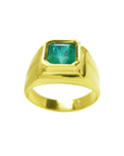 18k gold women's solitaire emerald ring with a bezel set natural colombian emerald, topside view