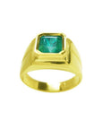 18k gold women's solitaire emerald ring with a bezel set natural colombian emerald, topside view