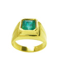 18k gold women's solitaire emerald ring with a bezel set natural colombian emerald, topside view