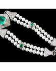 18K white gold emerald and pearl bracelet with diamonds, featuring a large bezel-set emerald.