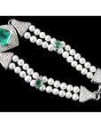 18K white gold emerald and pearl bracelet with diamonds, featuring a large bezel-set emerald.