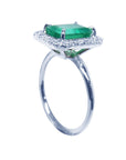 This ladies' emerald ring is showing the half side top and band profile.