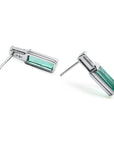2.00 ct natural baguette emerald stud earrings in 14k white gold with diamond accents and push backs.