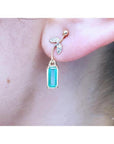 14K gold stud emerald leaf earrings with vibrant green rectangular emeralds and diamond accents.