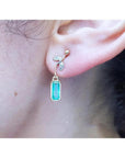 14K gold stud emerald leaf earrings with vibrant medium green rectangular emeralds and diamond accents.