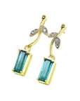 Left side position of a pair of emerald earrings, yellow gold, side and top profile view