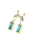 Left side position of a pair of emerald earrings, yellow gold, side and top profile view
