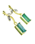 Right side of a pair of 14k yellow gold emerald earrings downside gallery profile view