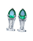 A pair of pear-cut Colombian emerald clip-on earrings crafted from 14k white gold.