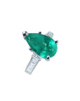 3.09 ct pear-shaped deep bluish-green emerald ring with princess-cut diamonds in 14K white gold.