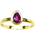 Ruby solitaire ring for women teardrop, 14k yellow gold bezel set