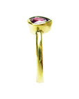 Teardrop natural ruby solitaire woman's ring 14K yellow gold, top-down half round shank profile view
