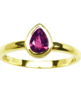 14K yellow gold ring with a vibrant teardrop natural ruby solitaire.