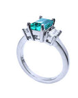 An emerald and baguette side diamond ring for ladies, half side profile,