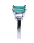 A side of a three stone emerald engagement ring, top and down profile display.
