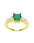 Natural colombian emerald with teardrop diamonds side ring for Mother's Day gift in yellow gold.