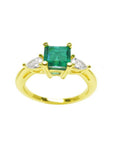 Natural colombian emerald with teardrop diamonds side ring for Mother's Day gift in yellow gold.
