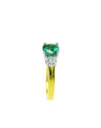 1.12 ct. round cut three stone emerald and diamond ring in 14k white and yellow gold.