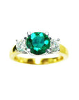 Round cut colombian emerald ring with side natural round cut diamonds three stone engagement ring.