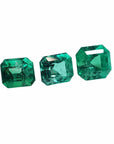 Three emerald-cut natural green emeralds, 1.93 carat matching set for jewelry.