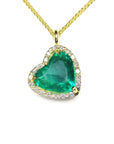 Gold necklace with a heart-shaped natural Muzo colombian emerald pendant.