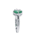 Negative space Toi et Moi ring the emerald showcases fine quality with its distinctive fancy cut, while the geometric trillion diamond creates striking visual contrast.