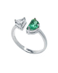 Handcrafted in 18k solid white gold this emerald is a fancy cut fine quality negative space Toi et Moi ring.