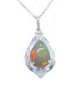 Pear-shaped rainbow Welo Ethiopian opal pendant in 925 sterling silver with cubic zirconia accents.
