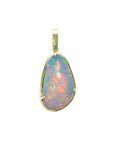 Natural Ethiopian opal pendant with vivid rainbow flashes in 14K yellow gold.