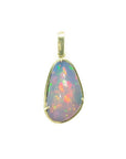 Natural Ethiopian opal pendant with vivid rainbow flashes in 14K yellow gold.