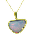 Opal pendant necklace with gold chain on a topside position white background