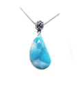 Teardrop-shaped blue larimar pendant on a silver chain topside view position.