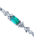 Topside view of a Muzo emerald Bracelet 1.08 Carats natural diamonds 14K White Gold.