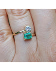 Women's natural Colombian emerald and diamond ring You and Me design, also known as a Toi et Moi ring, in 18k yellow gold.