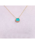 Solitaire emerald necklace tulip design square emeral-cut from Muzo Colombian mines prong set in 14k yellow gold