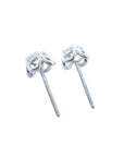 White gold tulip stud earrings with round natural diamonds, four-prong setting.